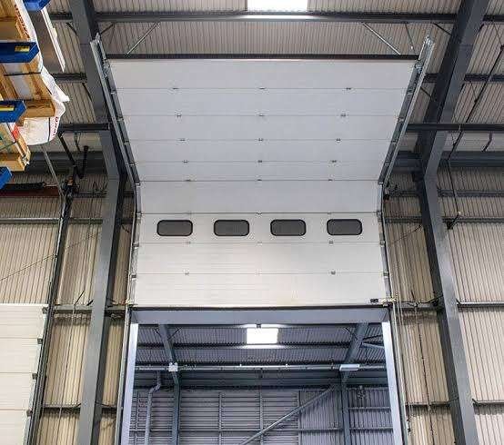 Why Are Experienced Automatic Sectional Overhead Doors Services Important for Helotes Properties?